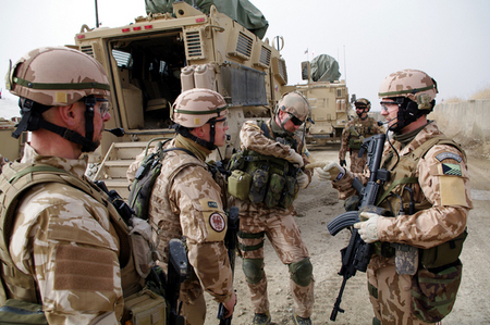 Team leader instructs soldiers