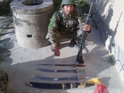 A sword and sabres found in a searched compound