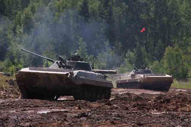 Infantry fighting vehicles BMP 2 begin attack