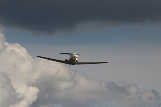 Yak-40 aircraft performing the flypast. 
