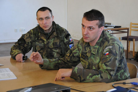 Exercise commander Major Alan Dubovy (left) with battalion commander Lieutenant Colonel Petr Prskavec at the command staff room