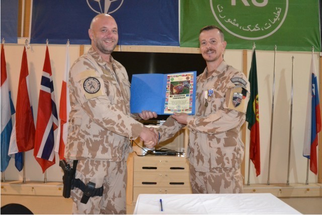 New and outgoing Commanders of AAT after signing the hand-over protocol