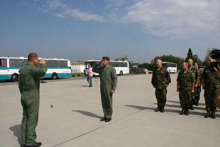 Contingent´s commander Colonel Lanci reports to Brigadier General Jaroslav Kankia at the airport before departure to Lithuania 
