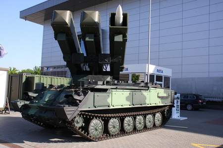 Containers with ASPIDE missiles mounted on a vehicle of KUB anti-aircraft system