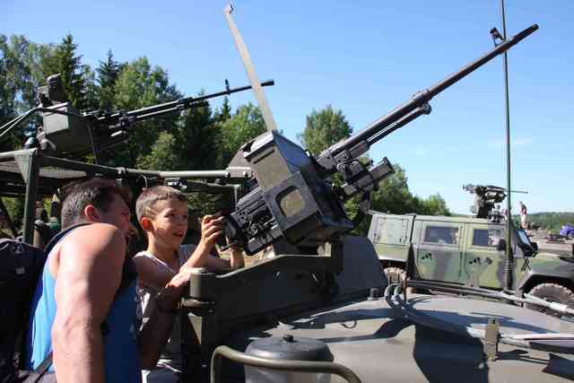 Children enjoying displays of equipment