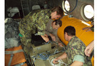 Illustration picture to the article Soldiers monitor radiation at 17 stations daily