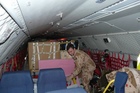 A technician checking fixing of supplies that include all necessary spare parts