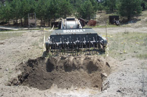 *Deep Dig in mine field* in sandy terrain