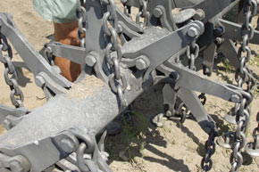 Detail of damaged flail-chain unit after explosion of an anti-tank mine