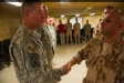 Czech Defence Minister Martin Bartak (right) awards commander of US Task Force Spartan COL David B. Haight with Czech medal