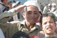 Children greet soldiers