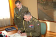 General Stefka signs the document